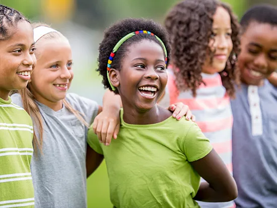 Energetic children playing outside, benefiting from Ashwagandha’s stamina-boosting properties.