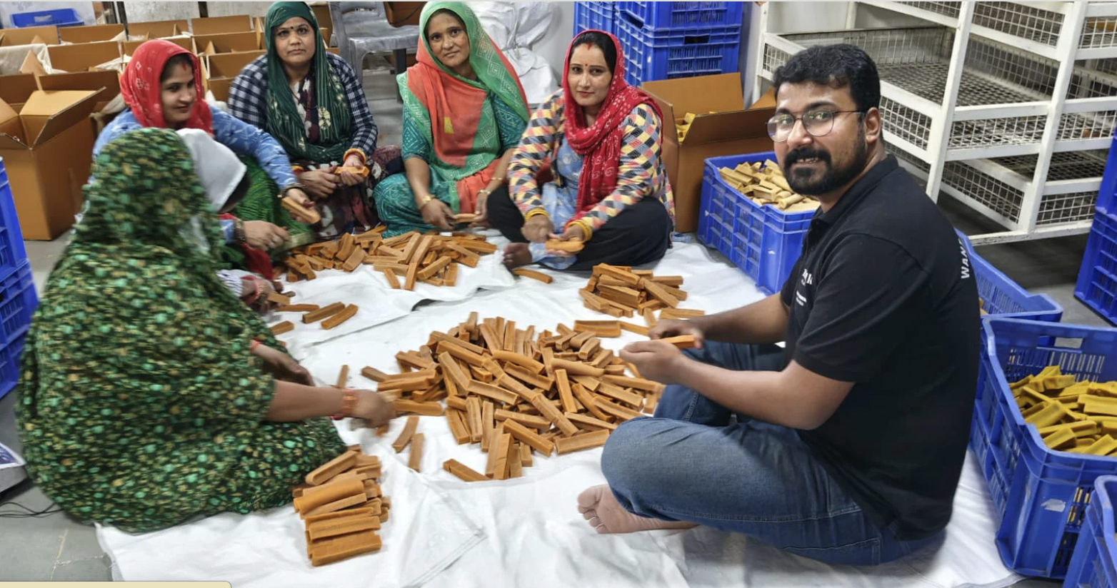 IndoFolk Wellness team at work on the factory floor
